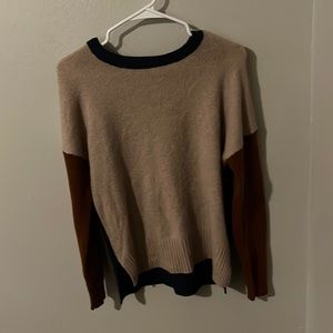 Color blocked medium blue, pink and maroon sweater.